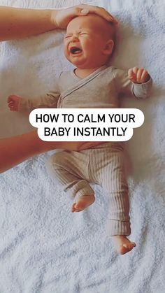 a baby laying on top of a bed with the words how to calm your baby instantly