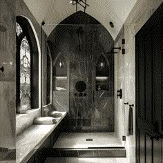 a black and white photo of a bathroom with a large walk in shower next to a window