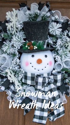 a snowman wreath with black and white plaid ribbon, green pine cone top hat and bow tie