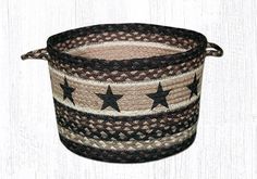 a brown and white basket with stars on it