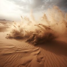 an image of sand blowing in the desert