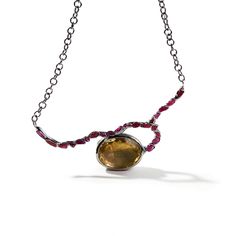 This modern designer necklace is anything but ordinary. It showcases a large, natural oval-cut lemon quartz. In stark contrast to its flawless facets, an unconventional row of uncut rubies is set using German Kabirski's original method. This necklace treads the line between raw and refined with confidence. It's a true one-of-a-kind piece, with no duplicates anywhere in the world. Metal: 925 Silver Stones: Lemon Quartz, Rough Ruby Plating: Black Rhodium Designer Necklace, August Birthstone Jewelry, July Birthstone Jewelry, Fine Art Jewelry, Ruby Necklace, Jewelry Ring Box, Pearl Jewellery Earrings, Lemon Quartz, Men's Jewelry Rings