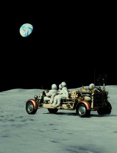 an image of astronauts on the moon with earth in the background