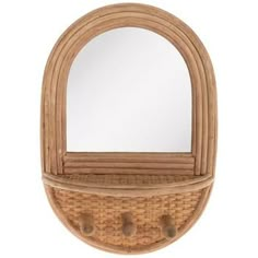 a wooden mirror and shelf with two hooks on it's sides, made out of wicker