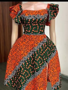 Beauty per excellence!! This dress will give you all the Elegance you need,with a catchy colour made for all skin type... My stunning dress is made with 100% cotton African print. This dress is made to order so customisation are very much welcomed.We can add or remove anything you wish.You are welcome to request a fabric change as well.We have lots of fabric options available. If you have any question please do well to start a chat. Thank you so much! Stylish Ankara Tops For Ladies, Trending Ankara Gown Styles 2023, 2023 Ankara Styles For Ladies, Ankara Dress Designs For Ladies 2023, Latest Ankara Short Gown Styles For Ladies 2023, Green Fitted Dresses With Traditional Patterns, Fitted Green Dresses With Traditional Patterns, Fitted Green Dress With Traditional Patterns, Orange Fitted Maxi Length Gown