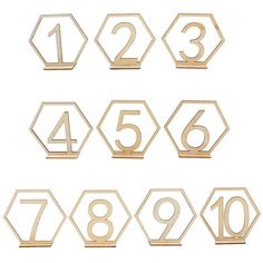 wooden numbers are arranged in the shape of hexagons