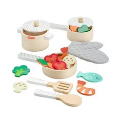 wooden kitchen utensils and cooking utensils are shown in this set up