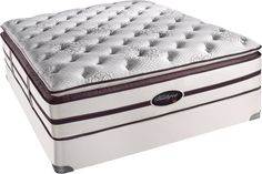 the mattress is white and has brown trimmings on it's bottom layer