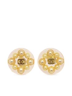 circa 1990-2000s gold plated polished finish stud design transparent design faux-pearl embellishment signature interlocking CC logo post-back fastening for pierced ears These earrings come as a pair. Condition: GOOD. This previously owned and used item is in good condition with minimal signs of use. This may include fading of material or plating and scratches. Purchasing this item continues its narrative and reduces the environmental impact by avoiding the use of new resources needed to make the product from scratch, such as water, materials and electricity, and avoiding additional manufacturing impact. Learn more about what makes a product Conscious on our Conscious Criteria page Pearl Embellishment, Stud Design, Stud Earrings Gold, Shopping Chanel, Demi Fine Jewelry, Transparent Design, Cc Logo, Fine Earrings, Pearl Stud Earrings