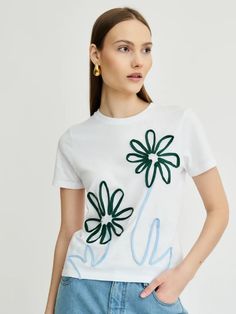 This floral take on the white tee features a pattern which uses recycled jersey yarn that’s been hand-sewn onto an organic cotton t-shirt. The baby blue and forest green detailing gives the white t-shirt a pop of colour. Want to take it up a notch? Pair with the Fauna patterned jeans for the ultimate flora and fauna style. Semi-fitted style Round neck Ribbed collar 100% certified organic compact ring-spun cotton Pattern is sewn on with recycled jersey yarn Model is 179cm wearing a top size 8. The Fabric: 100% organic compact ring-spun cotton & recycled jersey yarn Care Instructions 30° delicate wash or hand wash Artistic Garden, Maternity Nightwear, Flora Print, Patterned Jeans, Recycled Denim, Flora And Fauna, Tie And Pocket Square, White Tee, Clothing Co