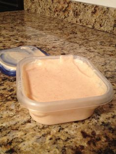 a plastic container sitting on top of a counter