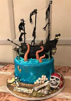 a cake decorated to look like a pirate ship