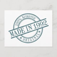 the made in 1971 logo on a white place mat with blue ink and green lettering