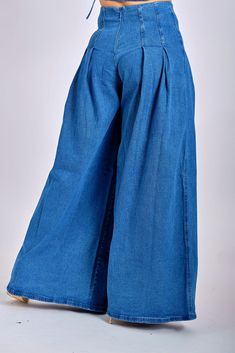 Great addition to your denim stash. This gorg denim pants features a high rise fit with a hidden zipper closure at the back. The wide leg and pleated back and front details are a great addition to an already perfect 'fit. You'll love this so much, you're definitely going to be reaching for these more often than not. Pair with some slides and your favorite crop top CONTENT & CARE Hand wash with cold water Hang to dry Do not bleach Cotton/Polyester/Rayon/Spandex DEETS & FIT Model is wearin Dark Wash Cropped Denim Wide Leg Pants, Dark Wash Denim Cropped Wide Leg Pants, High Waist Flare Denim Jeans, High Waist Denim Wide Leg Pants, Medium Wash Cotton Wide Leg Pants, Wide-leg Denim Bottoms, Wide Leg Denim Bottoms, High-waisted Dark Wash Denim Wide Leg Pants, Dark Wash Wide Leg Pants