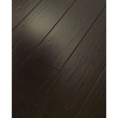 dark wood flooring is shown in this image