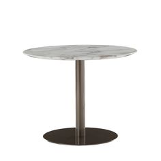 a round marble table with metal base