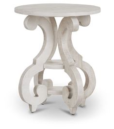 a white table with an intricate design on the top and bottom, against a white background