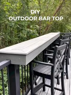 an outdoor bar top on a deck in the woods with text overlay that reads diy outdoor bar top