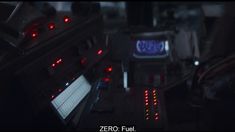 the control panel is lit up with red lights in this dark space scene from zero fuel