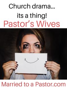 a woman holding up a paper with a smiley face on it and the words pastor's wives