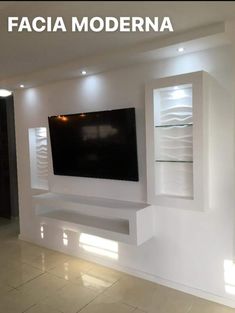 a large flat screen tv mounted to the side of a wall