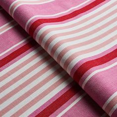 pink and white striped fabric with red stripes