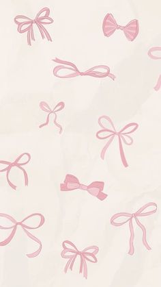 pink bows and ribbons on white paper