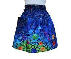 a blue skirt with colorful flowers on it