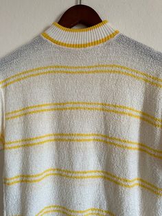 "Vintage striped mock neck sweater short sleeve 60s mod atomic 1960s yellow stripe knit shirt unisex 70s rude boy 1970s vtg Kurt Cobain Sweater  >> Please double check your measurements & compare to these listed below, for accurate sizing. Vintage often runs small, so don't rely on the tag size.  Tag reads: ILGWU UNION MADE  Measurements taken flat/unstretched : *Chest Width, armpit to armpit: approx 22\" (44\" chest)  *Length, from top of shoulder/collar seam: approx 23\"   >> In great vintage Retro Ribbed Winter Tops, Cotton Sweater With Contrast Stripes In Relaxed Fit, Striped Cotton Sweater With Relaxed Fit, Striped Cotton Sweater Relaxed Fit, Relaxed Fit Cotton Sweater With Contrast Stripes, Striped Relaxed Fit Cotton Sweater, Retro Fitted Tops With Ribbed Collar, Striped Cotton Sweater In Relaxed Fit, Retro Fitted Top With Ribbed Collar