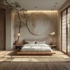 a bedroom with wood flooring and large round artwork on the wall above the bed