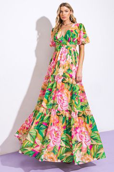 A printed woven maxi dress featuring V neckline, side cut out, short puff sleeve, tiered skirt, bare back with tie and button closureDetails:Self : 100% PolyesterLining : 100% Polyester Size & Fit- Model is 5`8" And Wearing Size Small- Measurements Taken From Size Small- Approx. Length: 62" Babydoll Dresses, Best Red Carpet Looks, Short Puff Sleeve, Resort Dresses, Flying Tomato, Swim Suits, Homemade Crafts, Tier Skirt, Red Carpet Looks