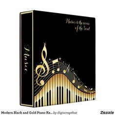 a music box with musical notes on the cover and gold trebles around it