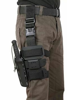 the holster is attached to the back of a man's pants