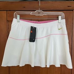 New With Tags, Never Worn. Super Cute Nike Flirty White Tennis Skirt With Pink Trim And Embossed Design. Attached Shorts. Nike Fitted Tennis Skirt For Spring, Nike Fitted Tennis Skirt, Nike White Fitted Tennis Skirt, Fitted White Nike Tennis Skirt, Fitted Nike Skirt, Nike Summer Lined Skirt, Nike White Summer Skirt, Nike White Lined Skirt, Nike White Skort For Spring