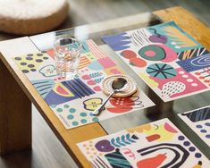 the table is decorated with colorful tiles and silverware