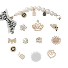 PRICES MAY VARY. 【Elegant & Vintage White Pearl Set】:Designer Shoes Charms which 12pcs a Set, include One Piece clogs Charms、 Bling Queen Jewelry、Cute Heart Jewelry、English Hat Jewelry、Vintage Oval Jewelry、Lucky Flower Jewelry、Butterfly Jewelry 、 Number Jewelry and White Soft Pompom Charms." 【Shoes Accessories Material 】:High Quality Gold Metal with Bling+Variety Big and Small Pure White Pearl +Shiny Rhinestone. Them are High Quality and Durable. 【Wil dly use 】:DIY For Clog Shoes、Bubble Slides、 English Hat, Designer Charms, Lucky Flower, Bubble Slides, Number Jewelry, Shoes Charms, Hat Jewelry, Oval Jewelry, Jewelry Butterfly