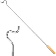 an umbrella with a wooden handle and metal bar attached to the pole, on a white background