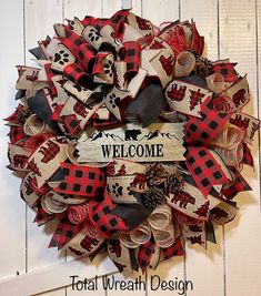 a welcome wreath made out of old book pages