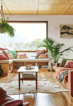 a living room filled with furniture and a fire place