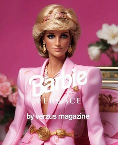 the barbie doll is wearing a pink suit and gold jewelry, sitting on a table