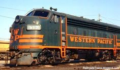 an old western pacific train sitting on the tracks