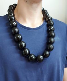 "Black statement wooden necklace for men Diameter a wooden bead - 1.48 inch (3cm) The beads are made from solid wood. Therefore, the necklace is quite heavy. The weight of a 30 inch necklace is 270 grams. The beads are strung on a strong nylon cord (not elastic). The mannequin is wearing a 30\" necklace. If there is no length you need in the selection list - let me know and I will make a desired length for you. If you have any questions, please contact me! *Back to my shop https://www.etsy.com/shop/IrinaJewelryBox?ref=hdr Thank you for visit." Necklace For Him, Necklace Big, Black Neck, Wood Bead Necklace, Wooden Necklace, Ball Necklace, Necklace For Men, Necklace Statement, Men's Necklace