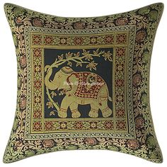 a decorative pillow with an elephant on it