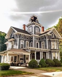 an old victorian style house in the country