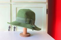 "womens wool material 1960s rare adorable and classic lovely shade of green 10\"width inside Thank YOU and please feel free to ask me any ?s:) Have a lovely day xoxo www.etsy.com/shop/retroandme" Vintage Green Adjustable Hat, Green Wool Felt Hat For Winter, Fitted Green Felt Hat For Winter, Green Cloche Hat For Winter, Green Wool Hat With Curved Brim, Green Wool Brimmed Hat, Green Wool Felt Hat With Curved Brim, Fitted Green Brimmed Felt Hat, Green Fitted Brimmed Felt Hat