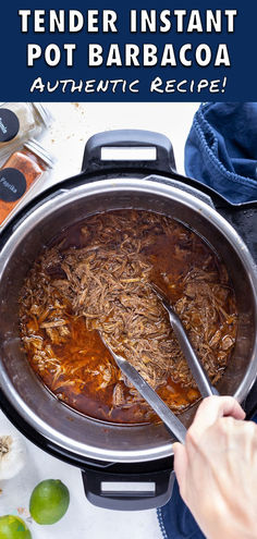 a pot filled with pulled pork and barbecue sauce on top of a white tablecloth