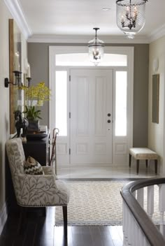 the foyer is clean and ready for guests to come home from work on their new house