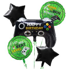 a bunch of balloons that are in the shape of a video game controller and stars