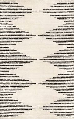 a white rug with black lines on it