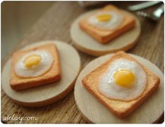 three pieces of bread with eggs on them